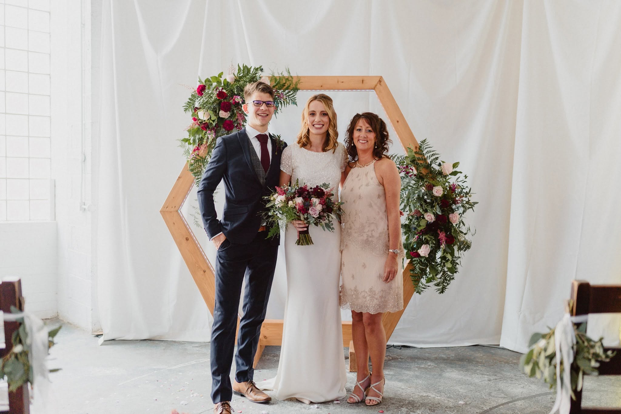 Couple and celebrant at a wedding ceremony
